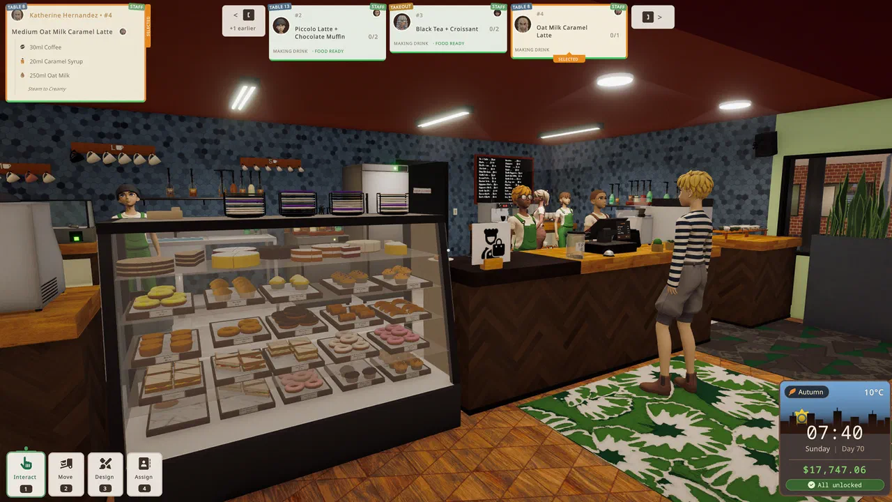 The pastry cabinet and checkout with customers waiting to order