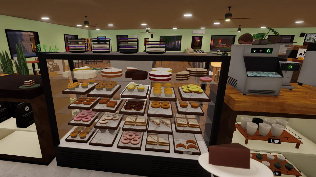 A display cabinet stocked with cakes, donuts and pastries